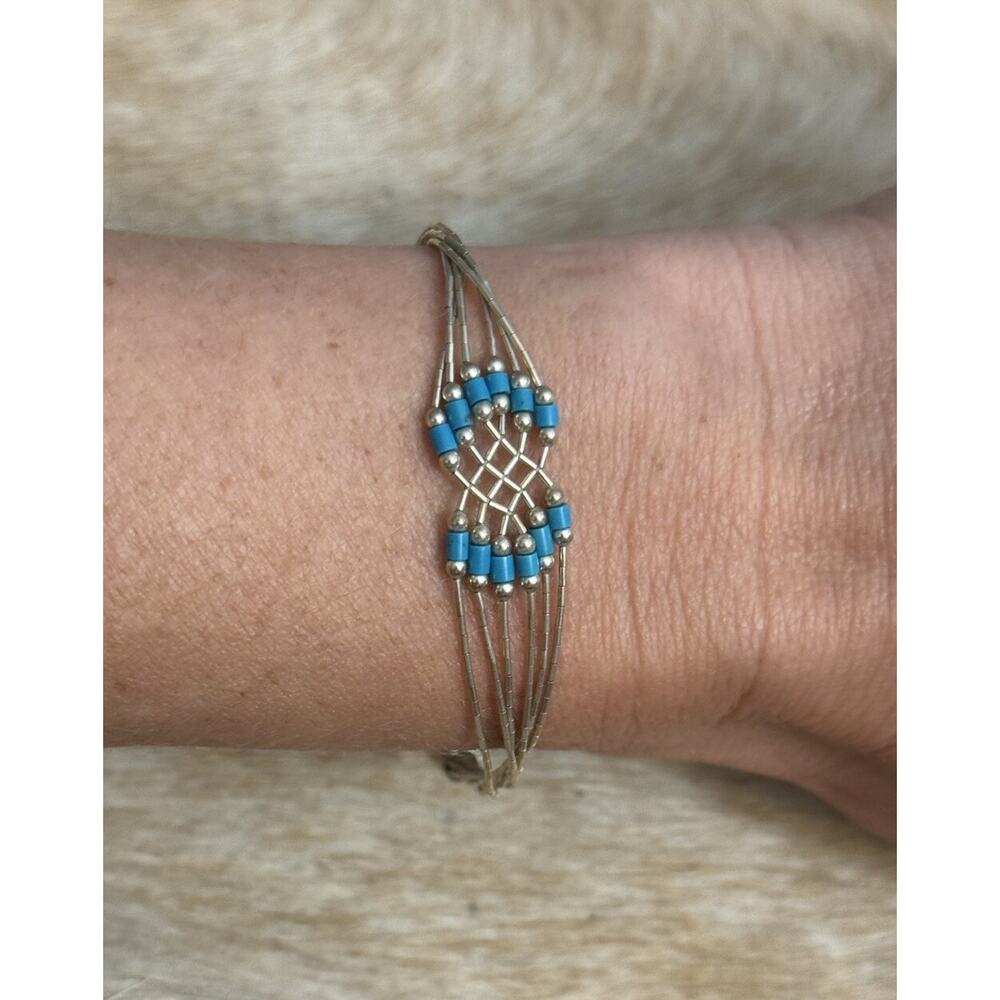 Native American SW Liquid Sterling Silver 6 Strand Turquoise Bracelet Cone Tips